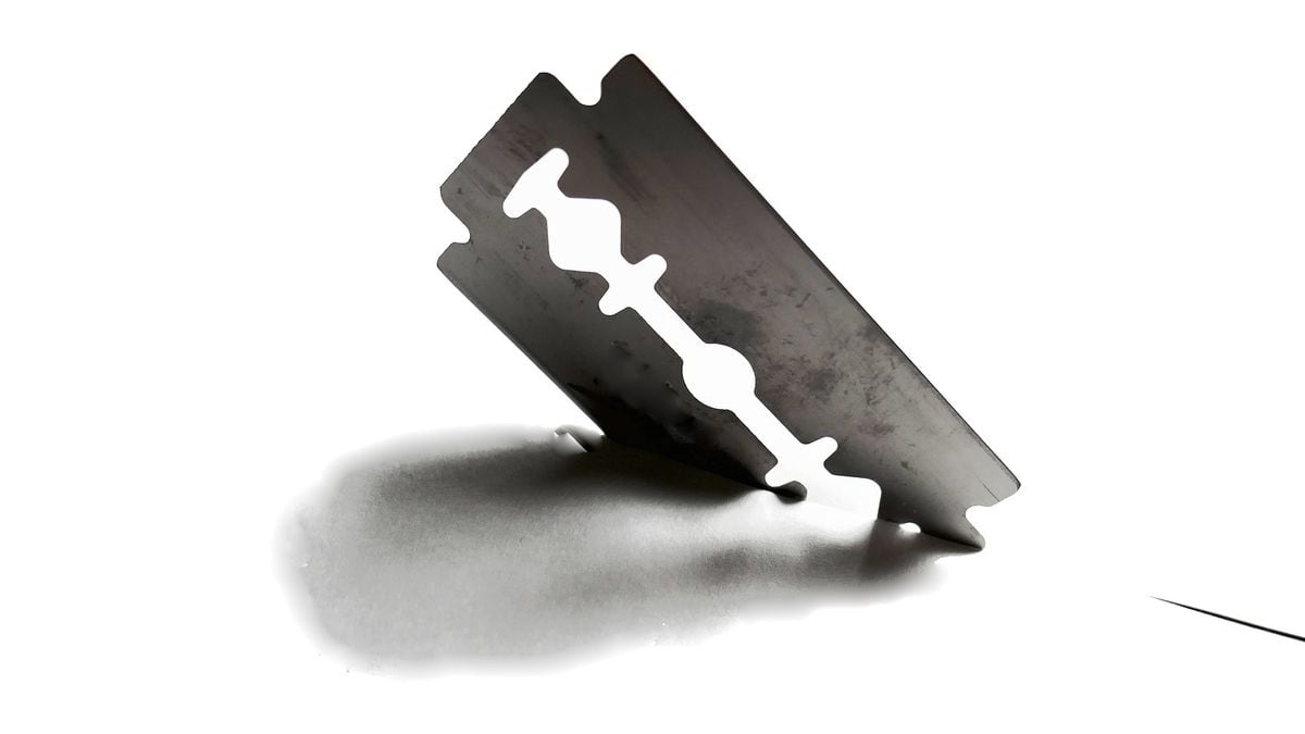 Razor blades found on handle of Michigan gas pump